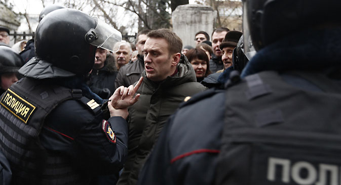 L'opposant Alexeï Navalny (au centre). Crédit : Photoshot/Vostock Photo