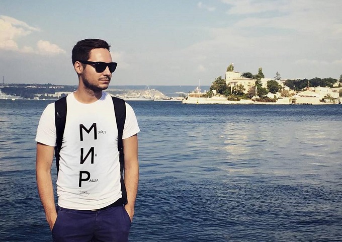 Kirill Karavayev in his T-short with acronym MIR ('Peace' in Russian) - 'Made in Russia.'