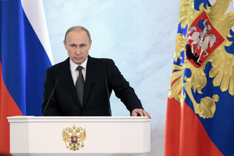 Presiden Rusia Vladimir Putin menyampaikan pidato tahunan di hadapan Dewan Federasi pada Kamis (4/12), di Moskow, Rusia. Foto: Mikhail Metsel/TASS