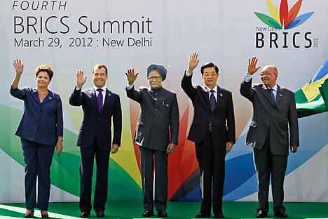 Brazil's president Dilma Rousseff, Russian President Dimitry Medvedev, Indian Prime Minister Manmohan Singh, Chinese President Hu Jintao and South African President Jacob Zuma pose during the 4th BRICS summit held in New Delhi, India, on Thrusday, Ma