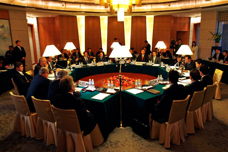 Envoys from Russia, the United States, North Korea, Japan, China and South Korea  meet at the beginning of a round  of six party talks in Beijing December 8, 2008. Source: POOL New / Reuters 