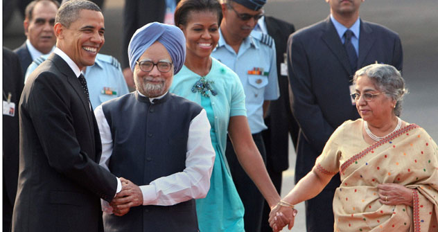 U.S. President Barack Obama, left, is greeted by Indian Prime Minister Manmohan Singh, second left, as first lady Michelle Obama is received by Singh's wife Gursharan Kaur, right, in New Delhi, India, Sunday, Nov.7, 2010. Source: AP