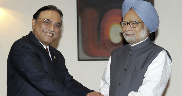 Pakistan President Asif Ali Zardari, left, shakes hands with Indian Prime Minister Manmohan Singh prior to their meeting at the latter's residence in New Delhi, India, Sunday, April 8, 2012. Source: AP