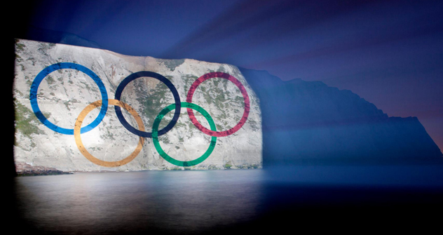 Giant Olympic Rings illuminate White Cliffs of Dover. Source: Press Photo