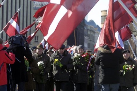 The annual procession commemorating the Latvian Waffen-SS unit in Riga on March 16, 2013. Source: Reuters