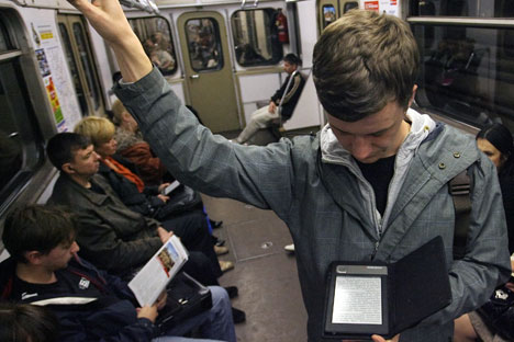 More and more people prefer to read from the screens of computers, smartphones, tablets, and e-readers, or even listen to audio books in their cars. Source: ITAR-TASS