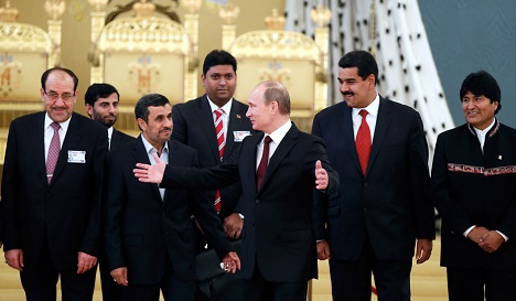 Bolivian President Evo Morales, Venezuelan President Nicolas Maduro, Russia's President Vladimir Putin, Iranian President Mahmoud Ahmadinejad, Iraqi Prime Minister Nouri al-Maliki and other officials at the GECF in Moscow. Source: Reuters