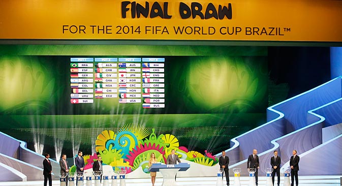 The drawing pots are listed on the screen during the draw ceremony for the 2014 soccer World Cup in Costa do Sauipe near Salvador, Brazil, Friday, Dec. 6, 2013. Source: AP 