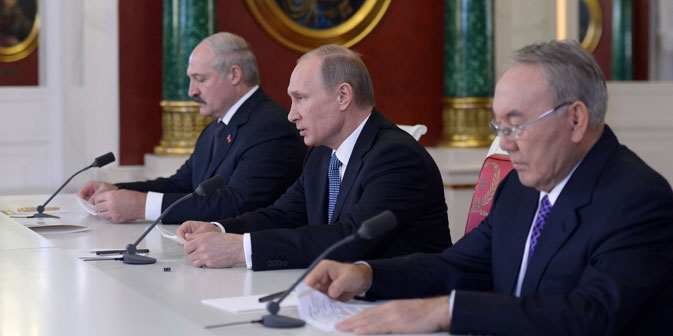 Presidents Vladimir Putin (center) of Russia , Alexander Lukashenko (left) of Belarus and Nursultan Nazarbayev (right) of Kazakhstan making a statement for the press after the end of the Supreme Eurasian Economic Council meeting in the Kremlin on December 24, 2013. Source: Itar-Tass