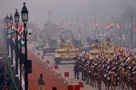 Indian army soldiers display the military hardware during the Republic Day parade in New Delhi on January 26, 2014. Source: AP