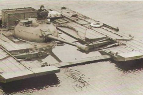 The weight of the PST-U was about 10 tonnes and its movement on water was carried out by a power transfer of the leading tank wheels to two propellers. Source: Press Photo