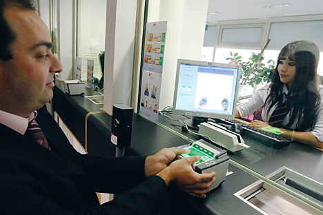 Starting this year, Russian embassies in the UK, Denmark, Myanmar and Namibia will launch a pilot project requiring applicants for a Russian visa to be fingerprinted. Source: Anton Denisov / RIA Novosti