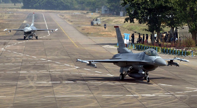 Two U.S. F-16 fighter aircraft taxi on a runaway at the Indian air force base Kalaikunda during the joint air force exercise Cope India 2005. Source: AP