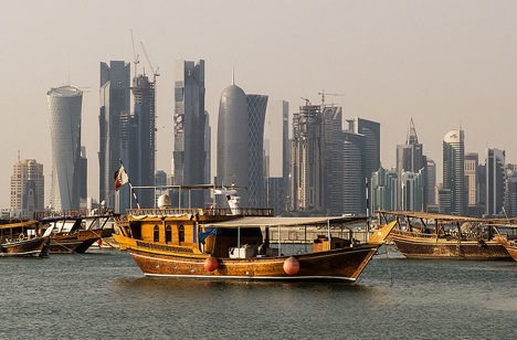 Traditional dhows in front of the West Bay skyline as seen from the Corniche, in Doha, Qatar. Source: StellarD / wikipedia