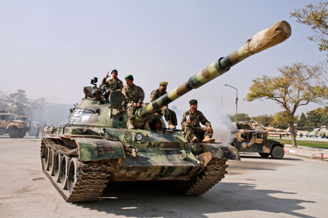 The consignment of Russian supplies to Afghanistan will include artillery guns, helicopters and armored vehicles. Source: AP