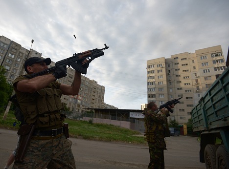 People's militia fighters during a battle with Ukraine's border guards in the Mirny neighborhood on the outskirts of Lugansk. Source: Evgeny Biyatov / RIA Novosti