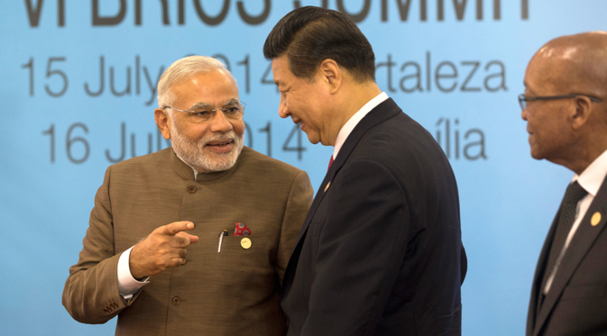 Xi during his meeting with Modi called for India’s active role in SCO. Source: AP