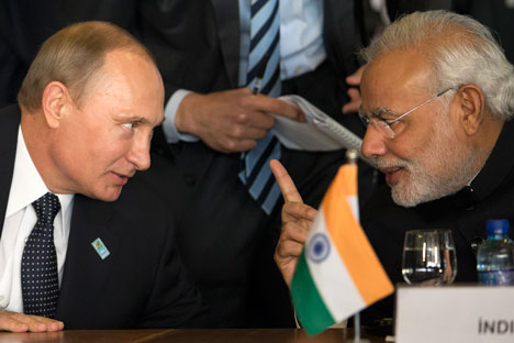 Narendra Modi and Vladimir Putin on the sidelines of the BRICS summit in July. Source: AP