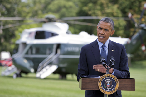 President Barack Obama speaks on the South Lawn of the White House in Washington, Tuesday, July 29, 2014, as he announces new economic sanctions against key sectors of the Russian economy. Source: AP