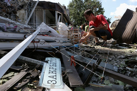 Ruined hopes: a bomb-damaged building in Donetsk, which has become a city under siege. Source: Reuters