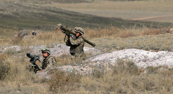 Military servicemen during the Interaction 2014 military drill for the Collective Rapid Reaction Force of the Collective Security Treaty Organization, at the Spassk Training Center in Kazakhstan. Source: Sergey Kuznecov / RIA Novosti