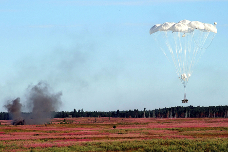 Airdrop of military equipment. Source: PhotoXPress