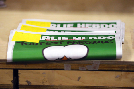 Reserved copies of the first edition of Charlie Hebdo published after the deadly attacks by Islamist gunmen in Paris last week, are pictured in a bookstore in Brussels January 15, 2015. Source: Reuters