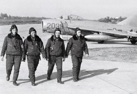 North Vietnamese Air Force MiG-17 pilots walk by their aircraft. Source: wikipedia