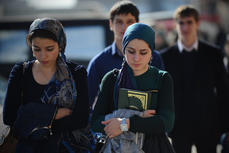 Young women seen near the Berkat market in Grozny, Chechnya, 2012. Source: Ramil Sitdikov / RIA Novosti