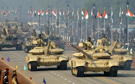 Indian Army battle tanks T-90, foreground, and T-72, background, go past the saluting base during the 54th Republic Day Parade. Source: AP