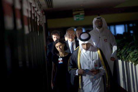 Russia's Foreign Minister Sergey Lavrov (C) walks with others before a trilateral meeting in Doha, Qatar August 3, 2015. Source: Reuters
