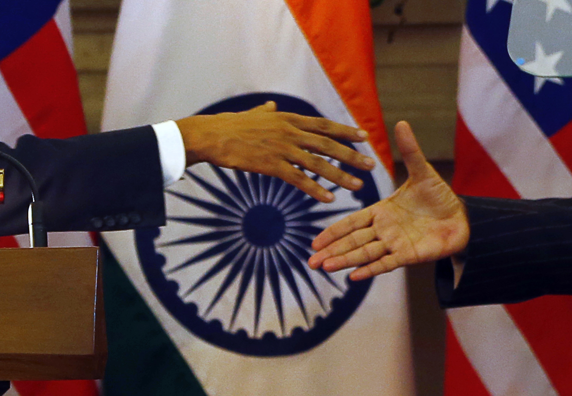 U.S. President Barack Obama, left and Indian Prime Minister Narendra Modi prepare to shake their hands after they jointly addressed the media after their talks, in New Delhi, India, Sunday, Jan. 25, 2015.
