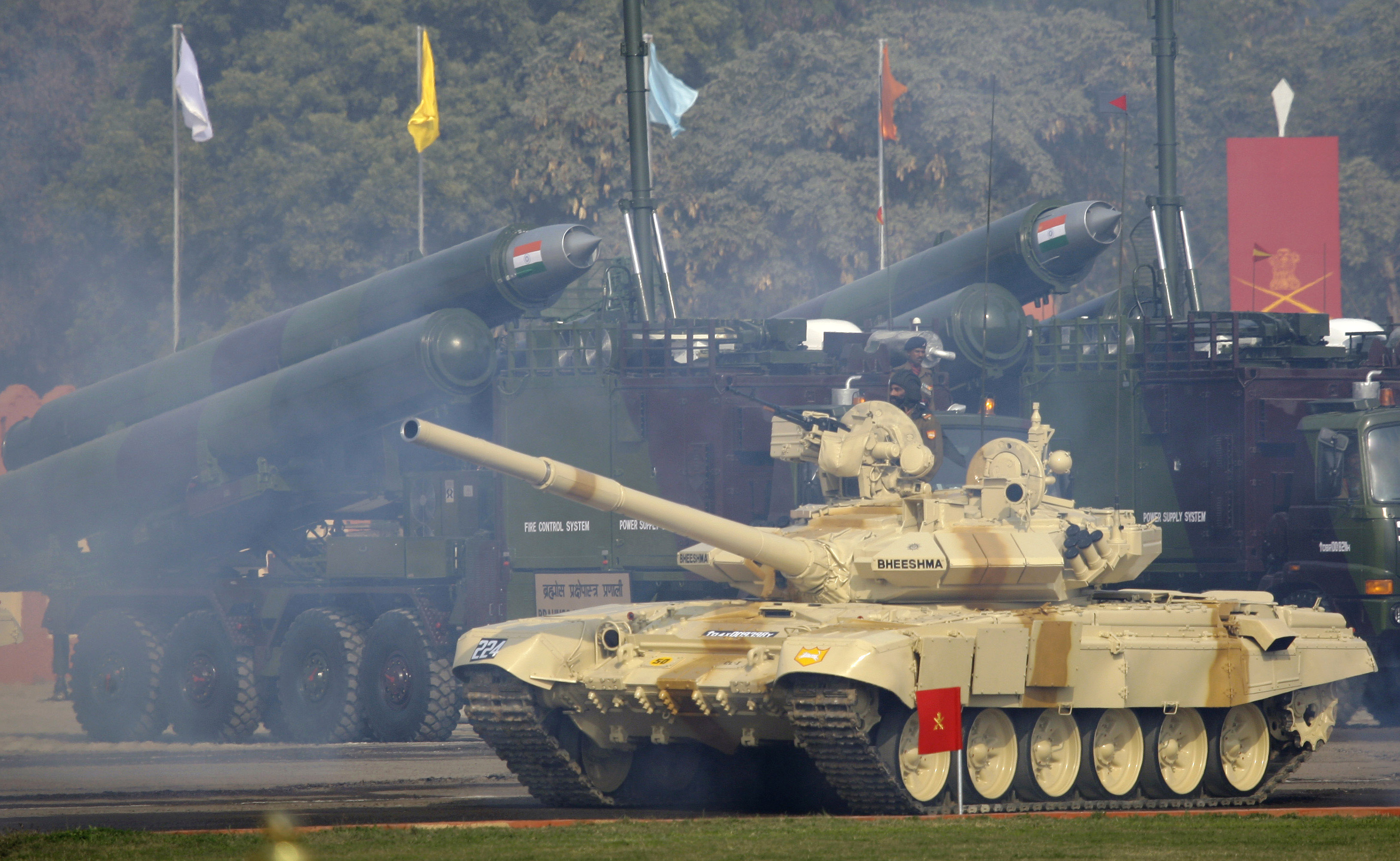 An Indian Army Bhishma tank, the locally assembled version of the T-90 S tank, rolls in front of vehicle mounted Brahmos missiles during Army Day parade in New Delhi, 2009.