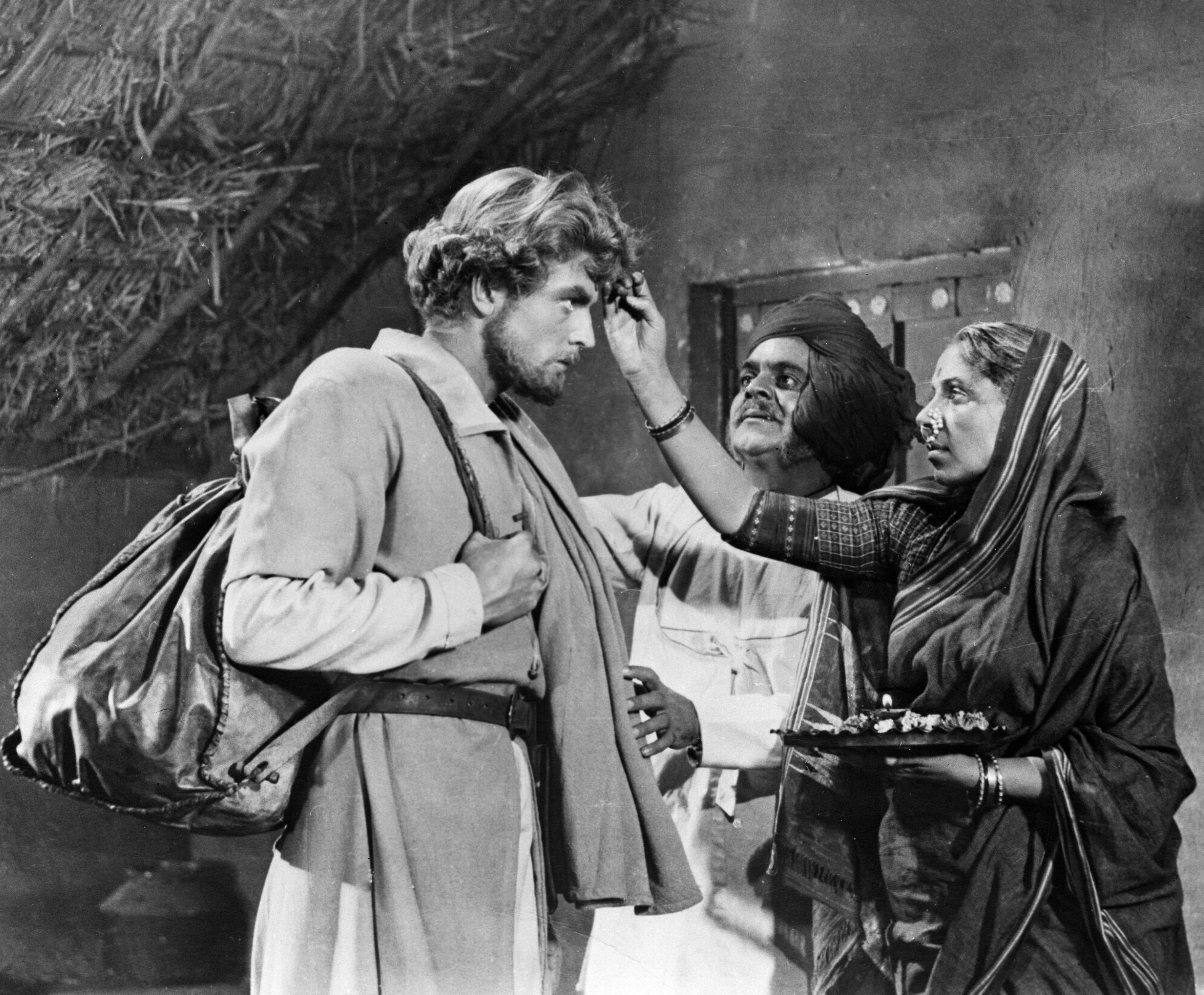 Soviet actor Oleg Strizhenov as Afanasiy Nikitin (left) and Indian actors at the shooting of the first Soviet-Indian movie "Over Three Seas".
