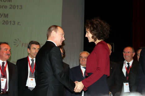 Vladimir Putin durante uno degli incontri economici del vertice (Foto: Evgeny Utkin)
