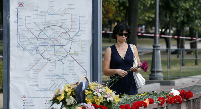 Fiori in una città in lutto (Foto: Itar Tass)
