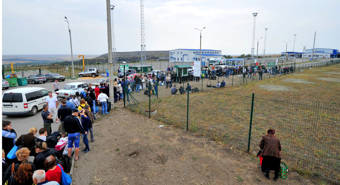 Rifugiati ucraini in fuga (Foto: Sergei Pivovarov/RIA Novosti)