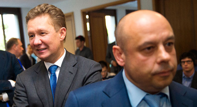 Украинскиот министер за енергетика Јуриј Продан минува покрај Алексеј Милер, извршен директор на Гаспром, по трилатералните преговори меѓу ЕУ, Украина и Русија во Берлин, 26 мај 2014. Извор: Ројтерс.