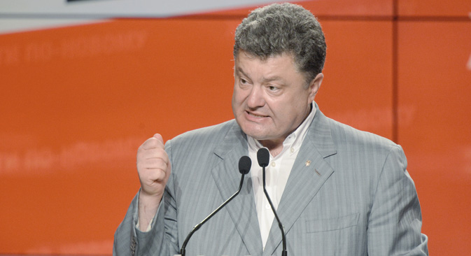 Петар Порошенко: „Где сте видели [насилно преузимање власти]?“. Извор: РИА „Новости“.
