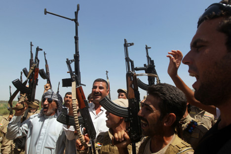 Шиитски волонтери пристижу у великом броју како би бранили Багдад и поново освојили територије које су заузели радикални исламисти. Извор: AFP.