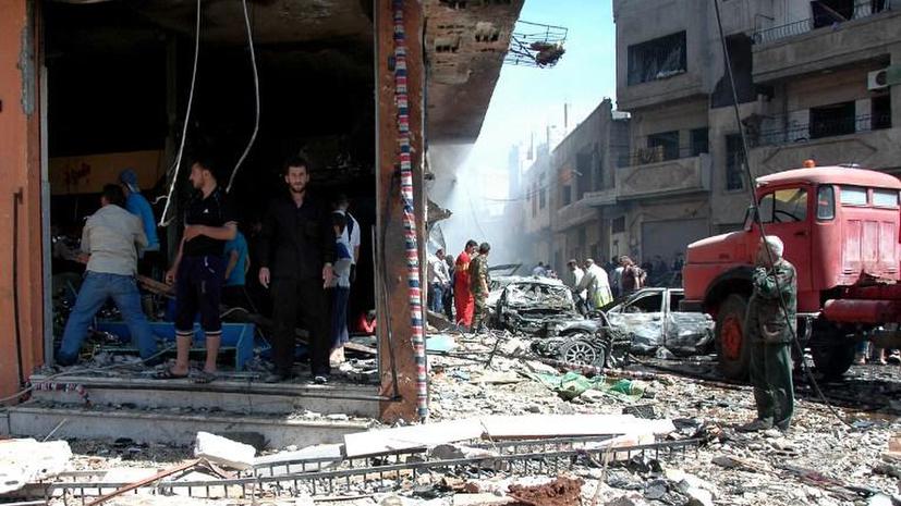 Серия терактов в Хомсе: Погибли 100 человек