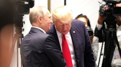 Владимир Путин и Дональд Трамп на саммите АТЭС