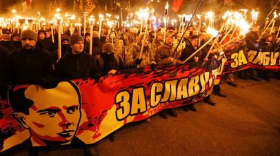 Активисты украинских националистических партий во время митинга, посвящённого 109-й годовщине со дня рождения Степана Бандеры в Киеве, Украина