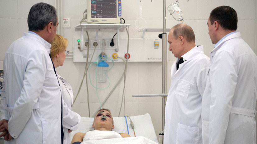 Путин посетил в кемеровской больнице пострадавших при пожаре в ТЦ