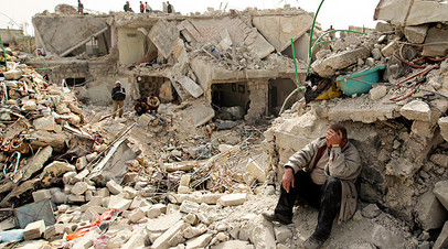 Разрушенный в ходе боевых действий сирийский город