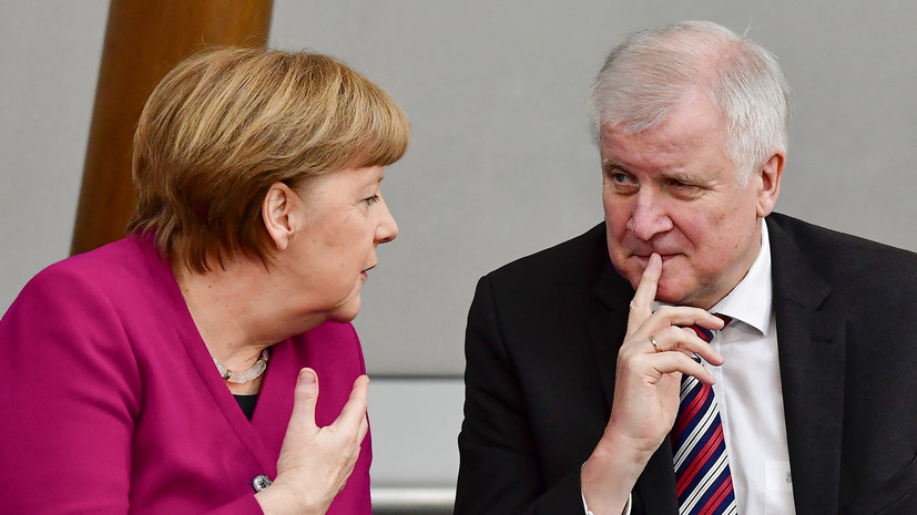 СМИ: Меркель обсудила с главой МВД Германии решения саммита ЕС по мигрантам