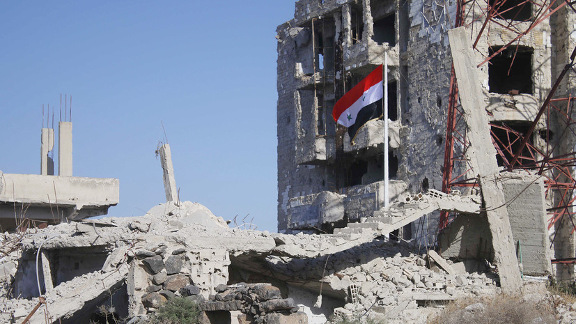 Армия подняла флаг Сирии на площади, с которой начались протесты в 2011 году