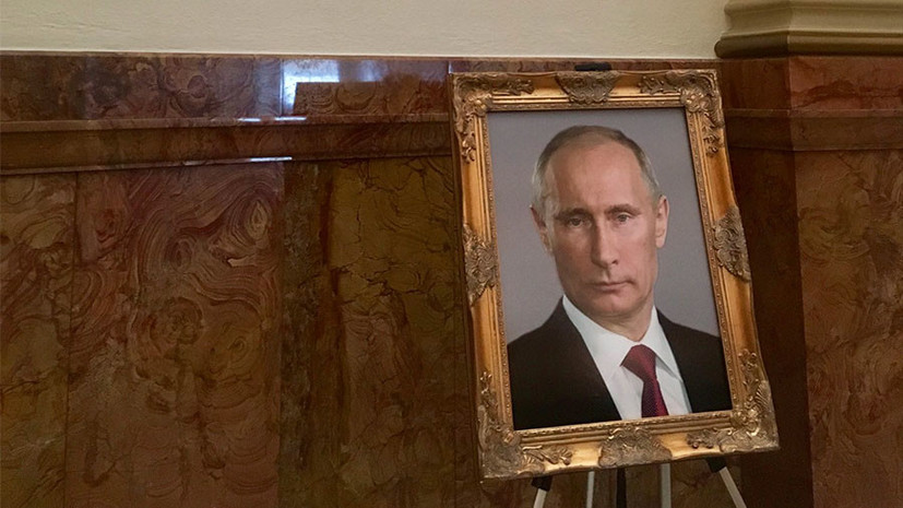 СМИ: Неизвестный разместил фото Путина на месте для портрета Трампа в капитолии Колорадо