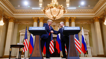 Владимир Путин и Дональд Трамп © Kevin Lamarque