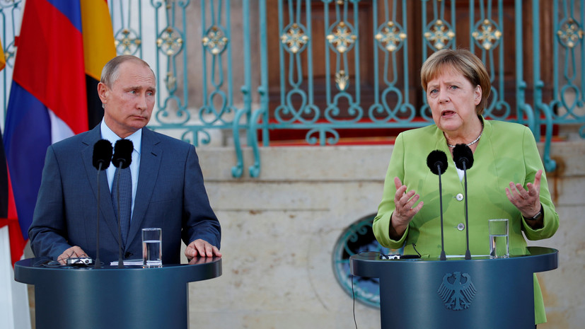 Путин обсудил с Меркель ситуацию в Сирии